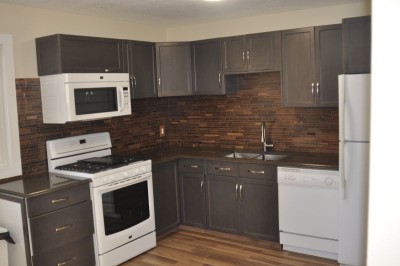 Maple cabinets, Quartz countertop, Vigo undermount sink, Maytag gas range, walnet hardwood backsplash